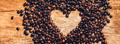 Coffee beans arranged in heart shape