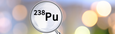 plutonium on the periodic table under a magnifying glass