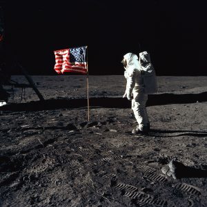Buzz Aldrin on moon with American flag